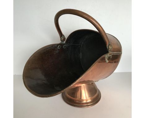 A late Victorian copper coal helmet 