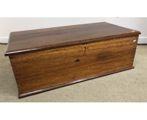 A teak trunk of plain form, 98.5 cm wide x 50.5 cm deep x 35 cm high