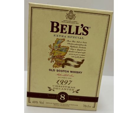One pottery bell-shaped bottle Bell's Extra Special Old Scotch Whisky Christmas 1997 8 year old decanter, 70 cl, original car