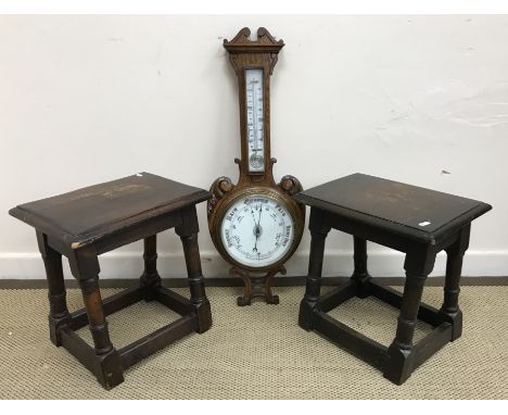 Two 20th Century oak joint stools in the 17th Century style, 38 cm wide x 28 cm deep x 38 cm high and an oak cased aneroid ba