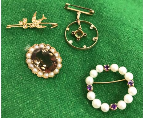 Four various seed pearl mounted brooches, one as a bird and clover, one set with oval smoky quartz, one set with four amethys