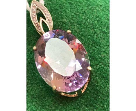 A 9 carat gold abacus style pendant set with five small diamonds with plain loop suspension, 2.5 cm x 1.5 cm not including su