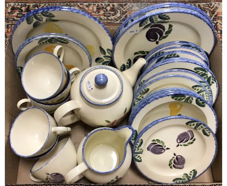 A quantity of Poole Dorset fruit spongeware decorated dinner wares to include plates, bowls, tea cups, milk jug and tea pot