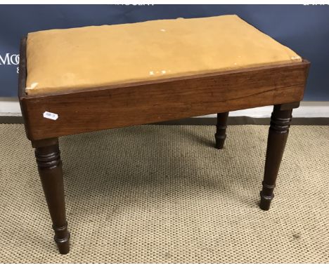 Two Victorian mahogany framed rectangular stools, one on brass caps and castors (bidet conversions), a reproduction mahogany 