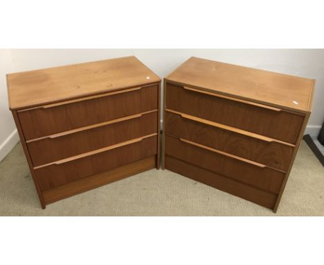 A pair of mid to late 20th Century three drawer bedroom chests, 74 cm wide x 40 cm deep x 67 cm high, together with a matchin