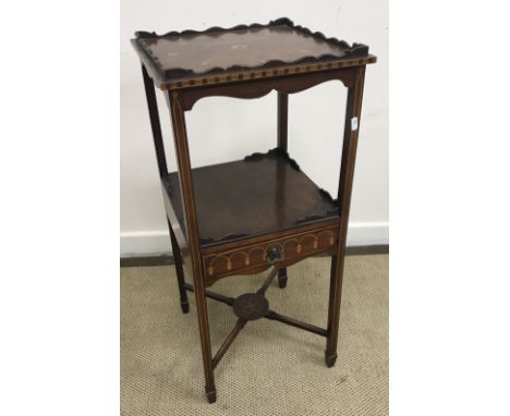 A 19th Century French ebonised rosewood cross-banded and floral marquetry inlaid three tier étagère with brass galleried uppe