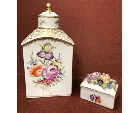 A Dresden floral spray decorated rectangular tea caddy and cover, 17.5 cm high, together with a floral encrusted rectangular 