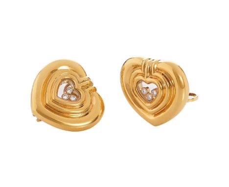 Paar Chopard Herzohrclips «Happy Diamonds» mit BrillantenGenf 1990er Jahre. GG 18 Kt. Steckbrisur mit Clip, herzförmige Schau