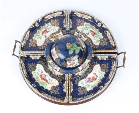 A WORCESTER STYLE LAZY SUSAN, comprising four quarter dishes, a bowl and cover and a circular dish with oriental pheasant dec