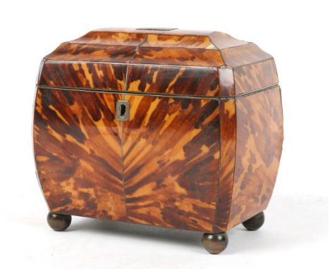 A GEORGE III TORTOISESHELL TEA CADDY with twin divisional interior, hinged rising lid and inset monogrammed brass plaque, 15c