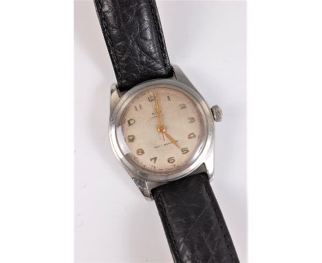 A gentleman's 1950's Tudor Oyster Shock Resistant manual wristwatch, the signed cream dial with gilt Arabic numerals and hand