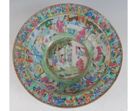 A large 19th century Chinese Canton famille verte bowl, the interior decorated in bright enamels with scholars and heightened