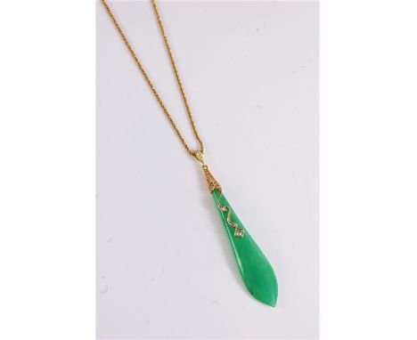 A jade and diamond pendant, the elongated teardrop pear shaped pendant, with a single undulating line set with diamond highli