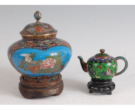 A Japanese Meiji period cloisonné enamel jar and cover, h.13cm, on turned hardwood stand; together with a miniature cloisonné