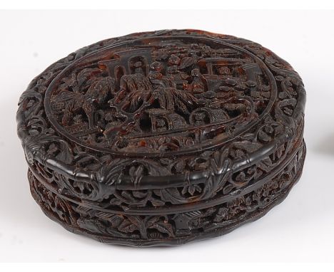 A mid-19th century Chinese tortoiseshell snuff box and cover, the whole finely carved in relief with figures amidst pavilions