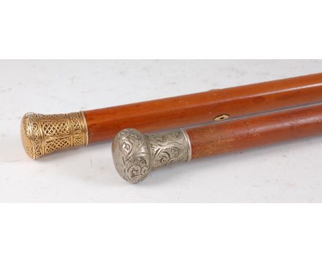 A late Victorian Irish gold-topped malacca walking cane, the cap having embossed Celtic panels and monogrammed, maker Edmond 
