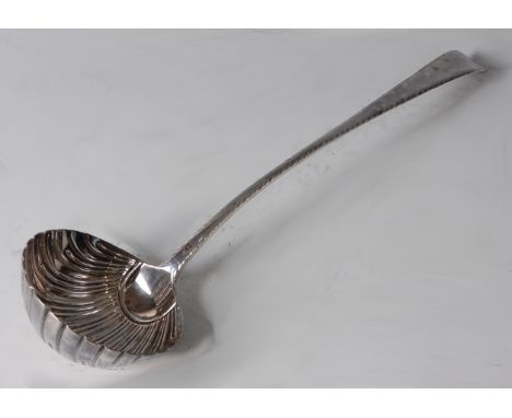 A George III silver soup ladle, in the Feather-edge pattern, having a shell shaped bowl, 5.2oz,maker Thomas Edwards of London