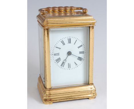 A French gilt brass gorge cased carriage clock, circa 1870, having a white enamel dial (hairline), visible platform escapemen