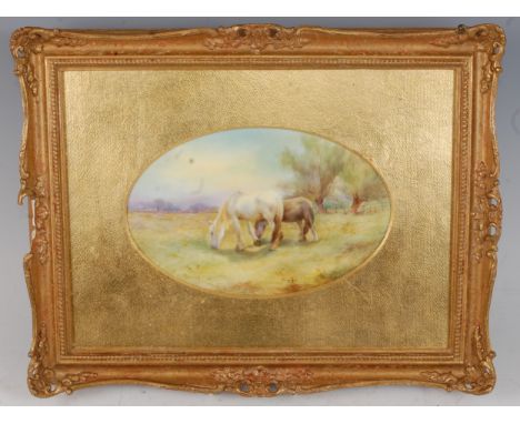 *A Royal Worcester porcelain plaque, hand-painted with horses grazing by G. Moseley, having puce backstamp verso, date code f