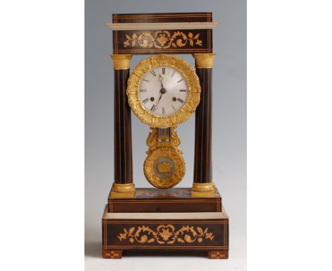 A 19th century French rosewood and marquetry inlaid portico clock, having gilt metal mounts, engine turned silvered dial with