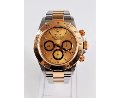 A gentleman's bi-metal Rolex Daytona Cosmograph 16523 automatic chronometer, the round signed champagne coloured dial with ba