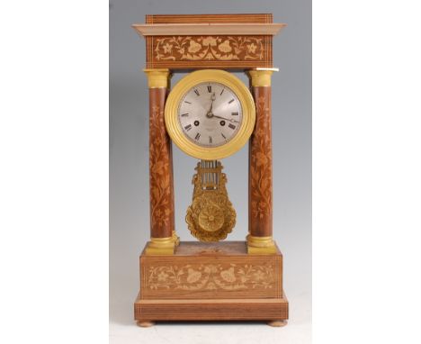 A late 19th century French faded rosewood and marquetry inlaid portico clock, with gilt metal mounts, the silvered engine tur