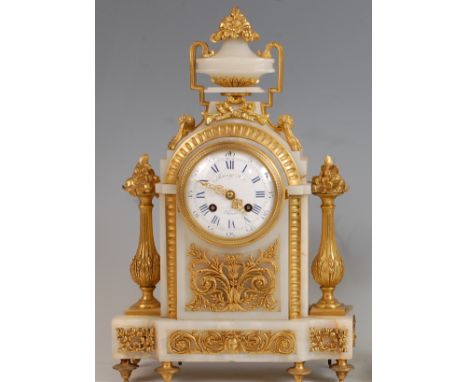 A mid-19th century onyx and gilt metal mantel clock, by Raingo Frères of Paris, having a signed white enamel dial with Roman 