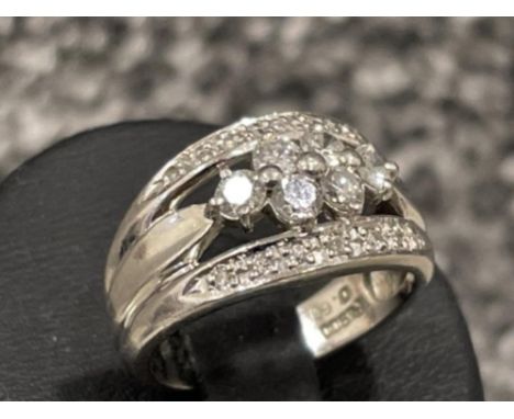 A Platinum and Diamond rings. Approx .60cts, size K 6.9g