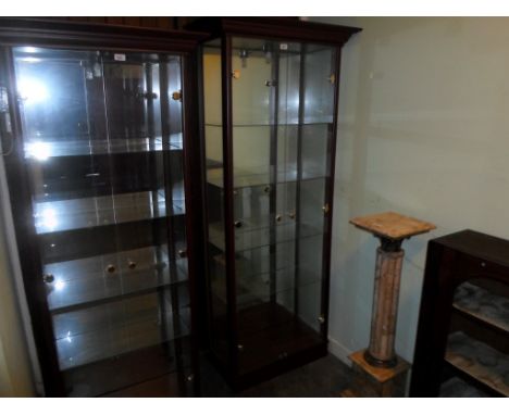 A contemporary two door glazed display cabinet, having internal lighting, 184cm x 78cm.