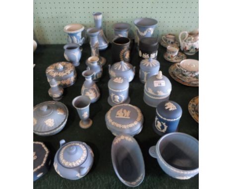 A large quantity of Wedgwood Jasperware, to include: vases, covered bowls, a candlestick and others.
