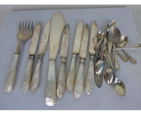 A quantity of English hallmarked silver spoons, various dates and makers, to include: mother of pearl handled cake knives, se