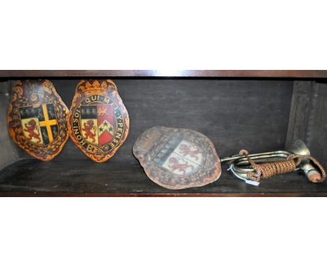 A military brass bugle, together with three wooden plaques with hand painted Heraldic coats of arms.