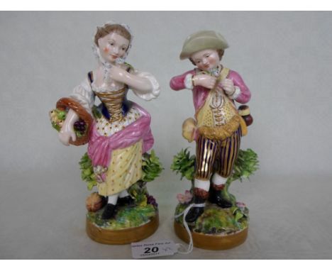 A pair of late 19th century Derby porcelain figurines, decorated throughout in polychrome enamel, puce Stevenson & Hancock De