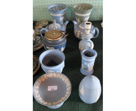 Ten pieces of Wedgwood Jasperware, to include: a sage green stem vase, another similar in pale blue, two teapots, a lamp base