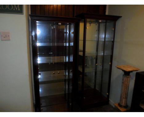 A contemporary two door glazed display cabinet, having internal lighting, 175cm x 78cm.