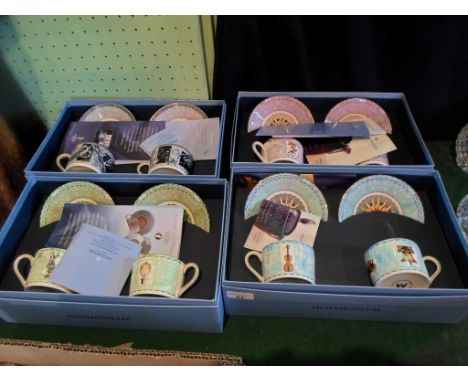 Four boxed Wedgwood Millennium Collection teawares, each containing a pair of cups & saucers, their decoration commemorating 