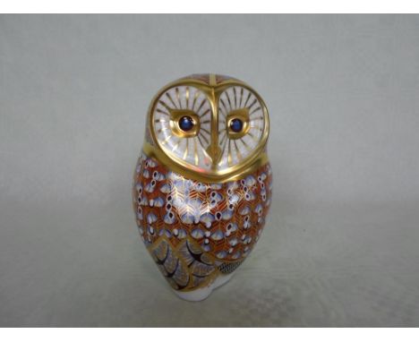 A Royal Crown Derby ceramic paperweight modelled as a owl, gold stopper to base, 11cm,