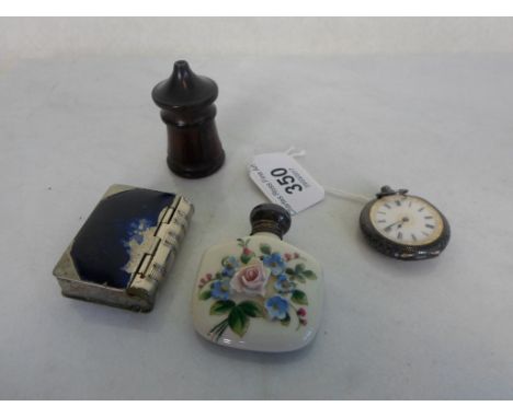 A ceramic scent bottle with relief foliate decoration, together with a lady's silver cased fob watch, a treen pepper pot and 