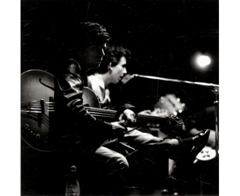 Brüchmann, Peter -- The Beatles performing at the Top Ten Club, Hamburg. 1961/printed 1980s. 4 ferrotyped gelatin silver prin