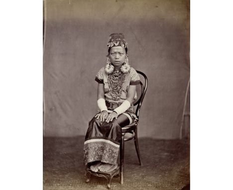 Lambert, Gustave Richard -- Higher ranking Dayak woman at Kuching in Sarawak, Borneo. Before 1888. 2 albumen prints. 26,5 x 2