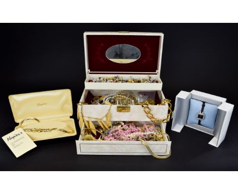 A Jewellery Box Containing A Large Collection Of Mixed Costume Jewellery Three compartment case with inner mirror containing 