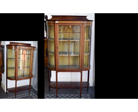 Edwardian Mahogany Display Unit Breakfront Shaped Form and Astral Glazed door, bow glass sides, raised on tapering supports w