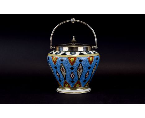 A Nortiake Biscuit Barrel Vintage ceramic biscuit barrel with silver tone lid and handle. Finished with stylised oriental des