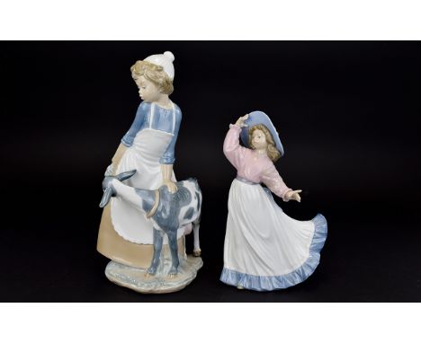 Nao by Lladro Hand Painted Figures ( 2 ) In Total. Comprises 1/ Young Girl In Flowing Long Dress with Large Matching Hat. Mod