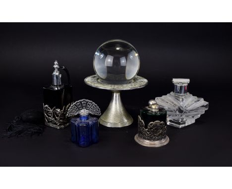 A Spherical Glass Globe On Pewter Tone Stand With Zodiac Design Transparent glass sphere on footed base, the surround impress
