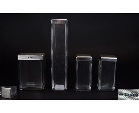 Ladies - Early 20th Century 4 Piece Vanity Set, Consisting of ( 4 ) Four Graduated Silver Topped Glass Jars - Engine Turned w