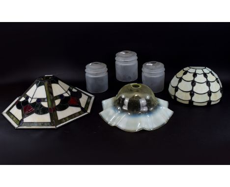A Collection Of Reproduction Tiffany Style Glass Shades Six items in total to include Tiffany style wall sconce with ruby ton