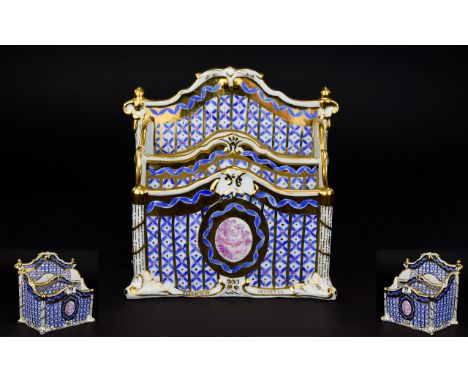 A Sevres Style Ceramic Letter Rack Ornate hand painted French style letter rack decorated with reapeated blue and gilt stripe