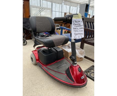 A REVO MOBILITY SCOOTER WITH KEY AND CHARGER 