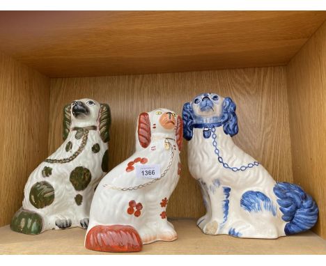 THREE CERAMIC STAFFORDSHIRE SPANIELS 